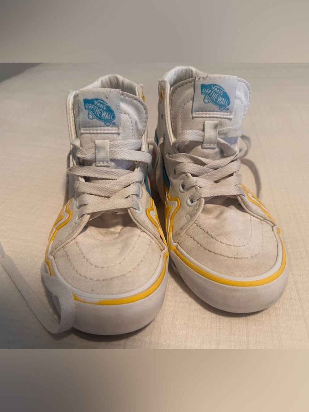 Vans Kids High-Top Sneakers in White with Yellow and Blue Accents